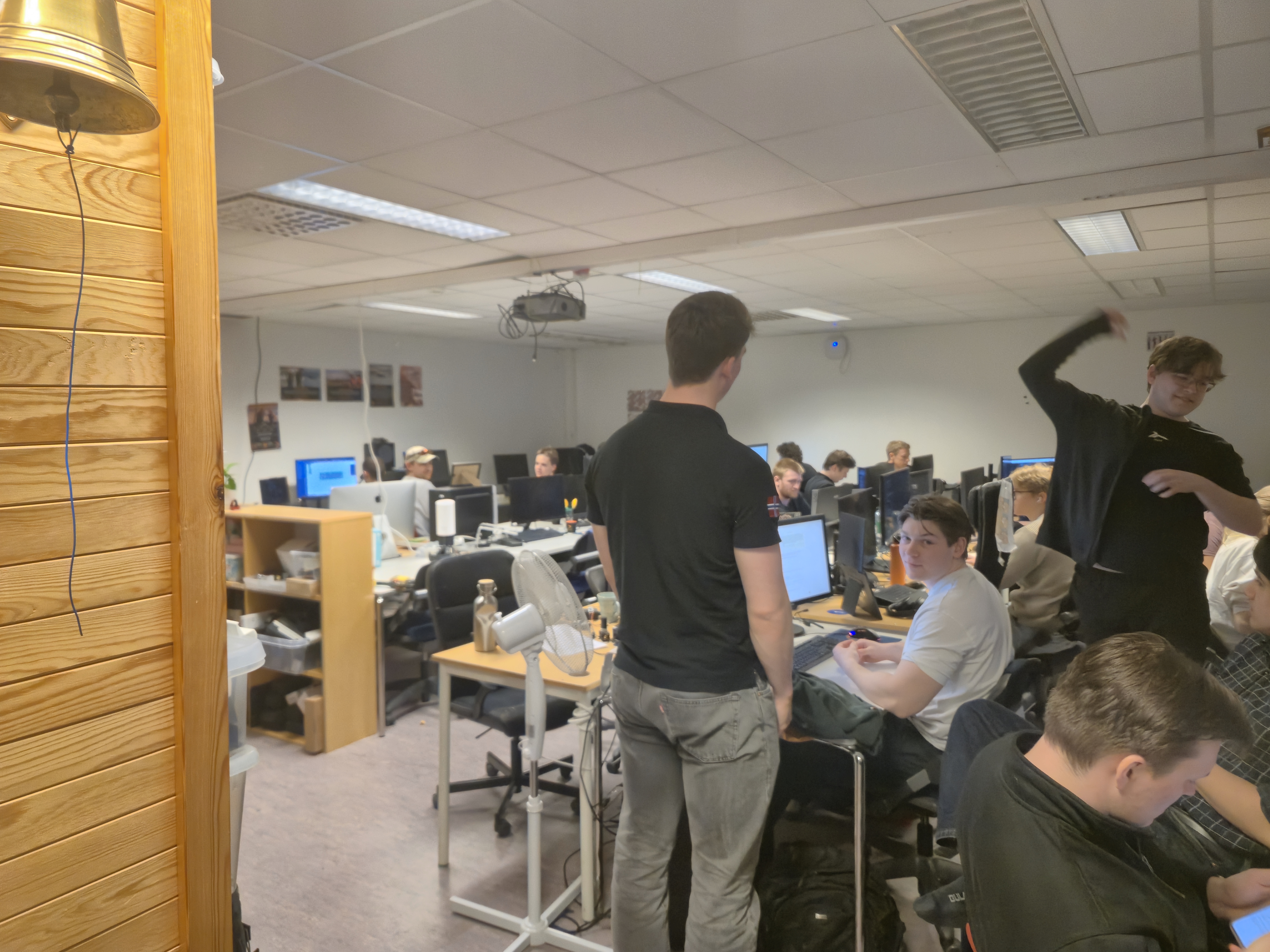 Ascend NTNU members working at their computers in the team room.